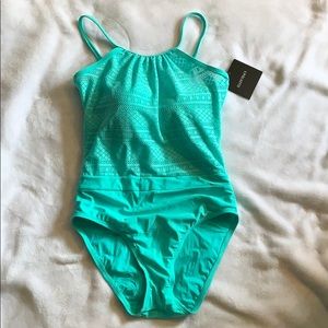 One piece bathing suit. Size 6. Brand new with tag